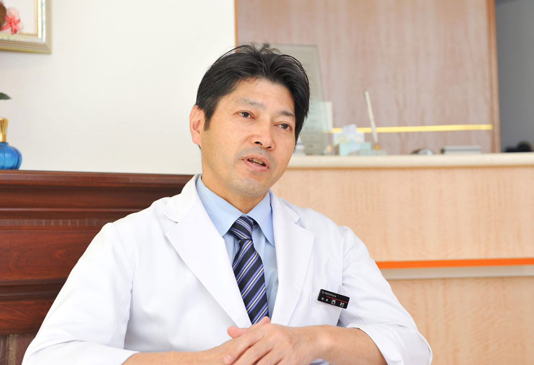 インプラント・歯周病指導医 西村 紳二郎

